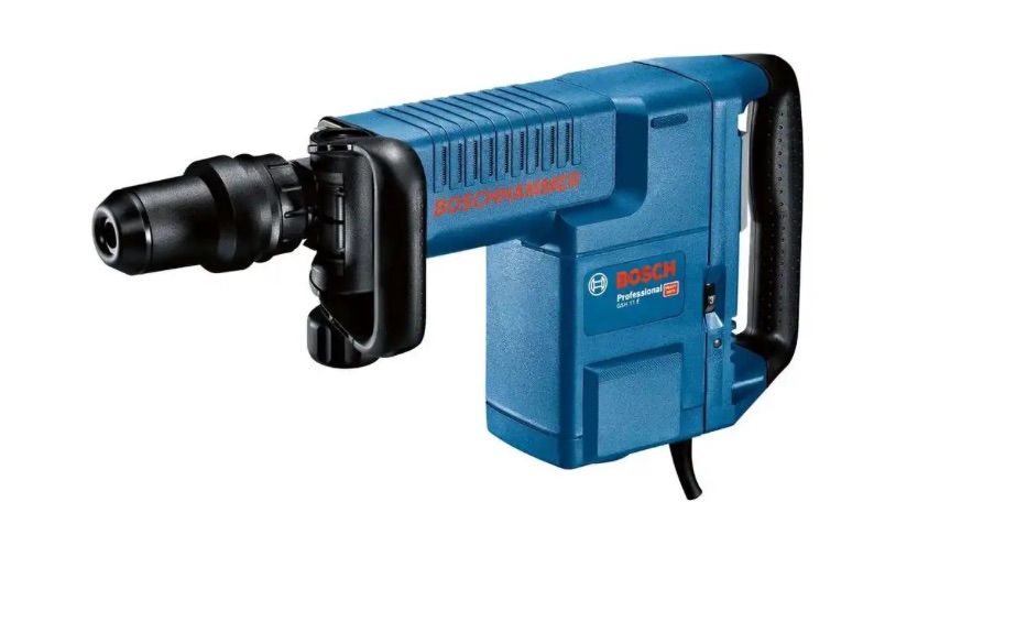 Eight shirts arranged on table in black, olive, grey, blue, white, red, mustard, and green.